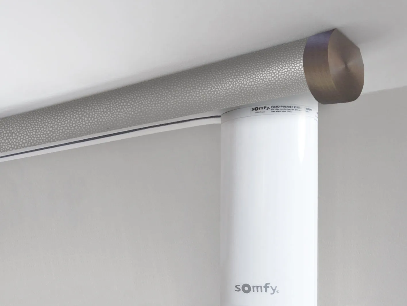 Motorised ceiling fix curtain pole set in 50mm dia. pebble wrap with end cap finials
