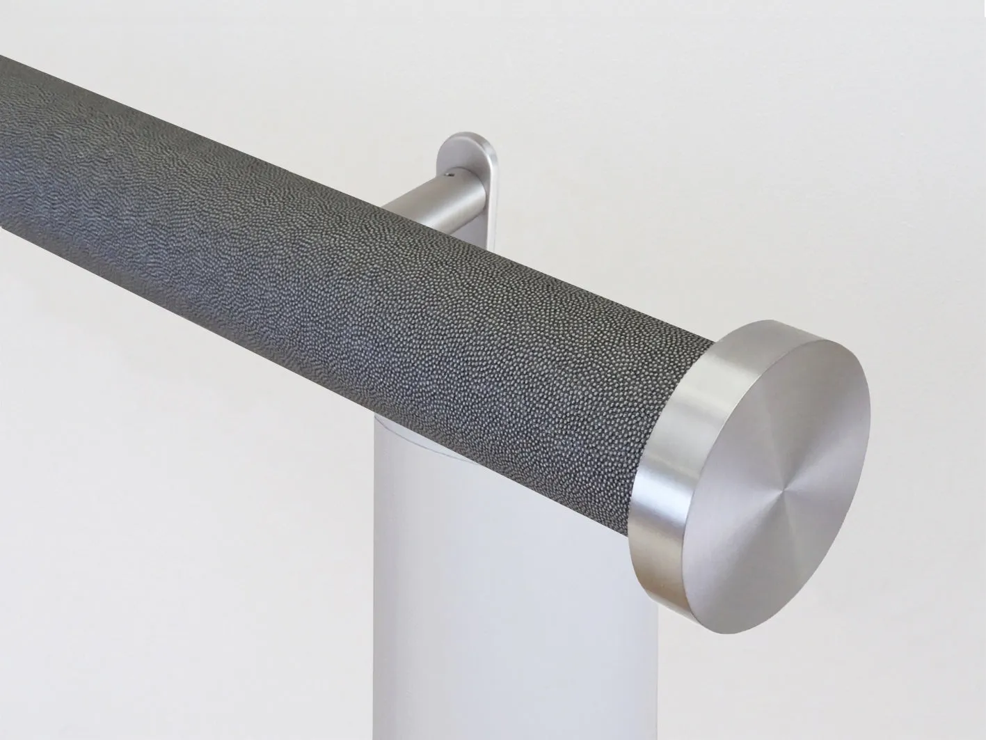 Motorised curtain pole in 50mm dia. black pepper wrap