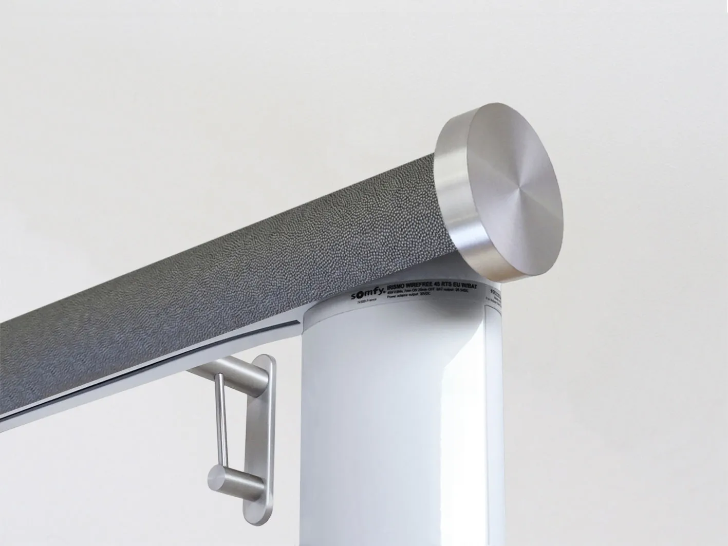 Motorised curtain pole in 50mm dia. black pepper wrap