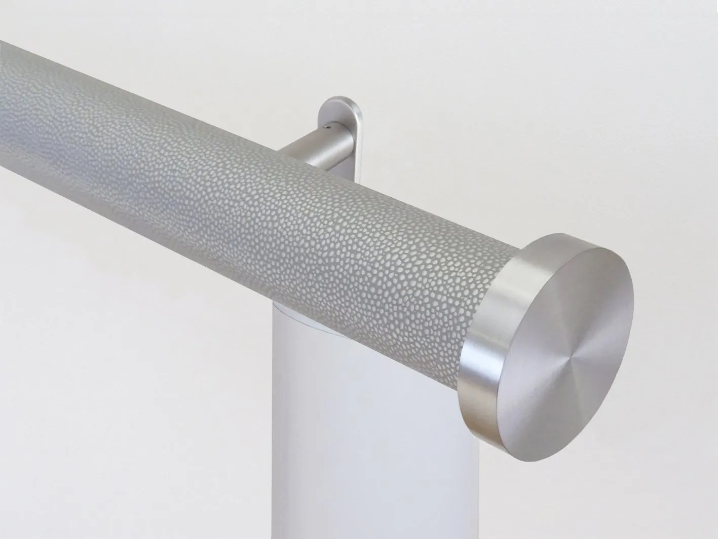 Motorised curtain pole in 50mm dia. pebble wrap
