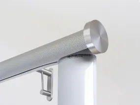 Motorised curtain pole in 50mm dia. pebble wrap