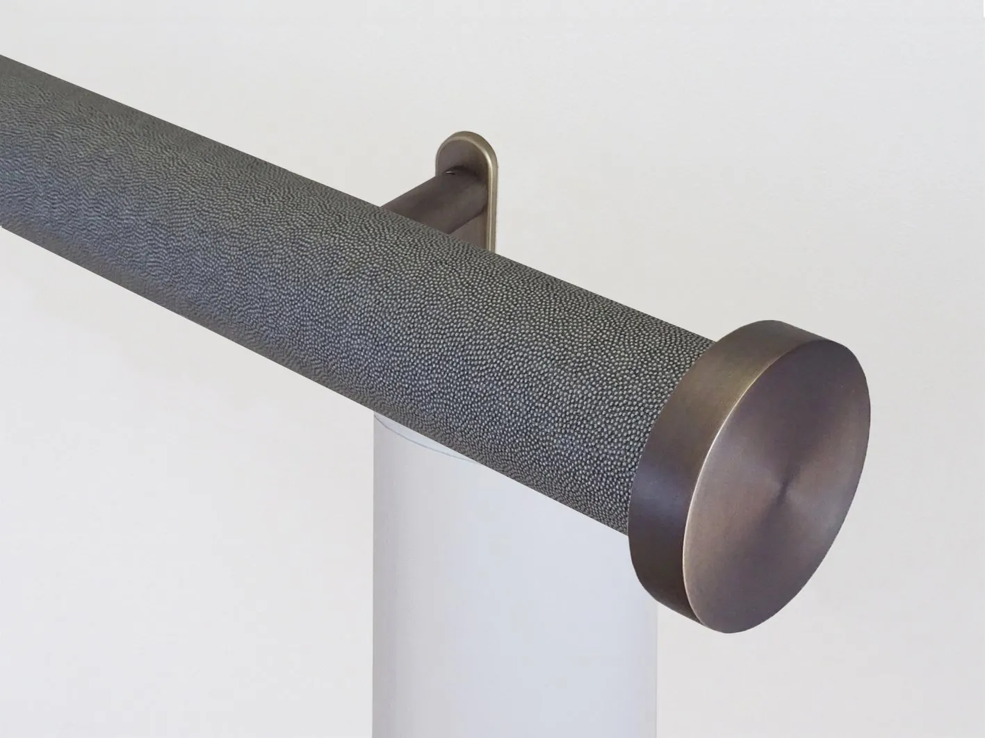 Motorised curtain pole set in 50mm dia. black pepper wrap with mini disc finials