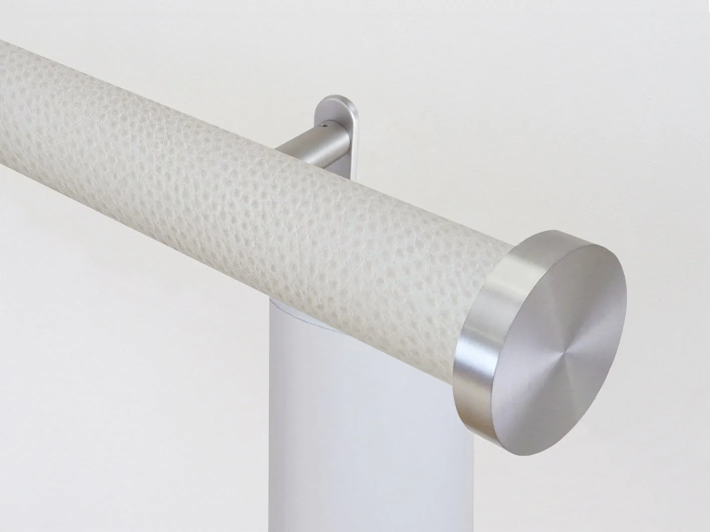 Motorised curtain pole set in 50mm dia. ostrich wrap with mini disc finials